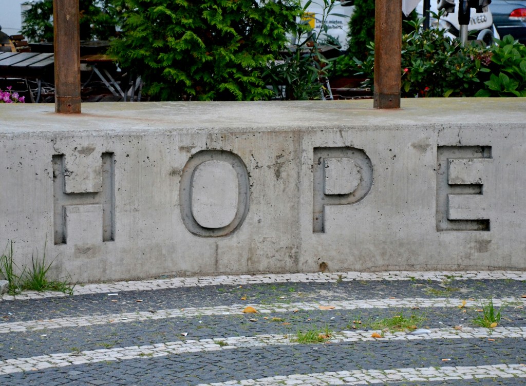 image of the word Hope set into a concrete wall